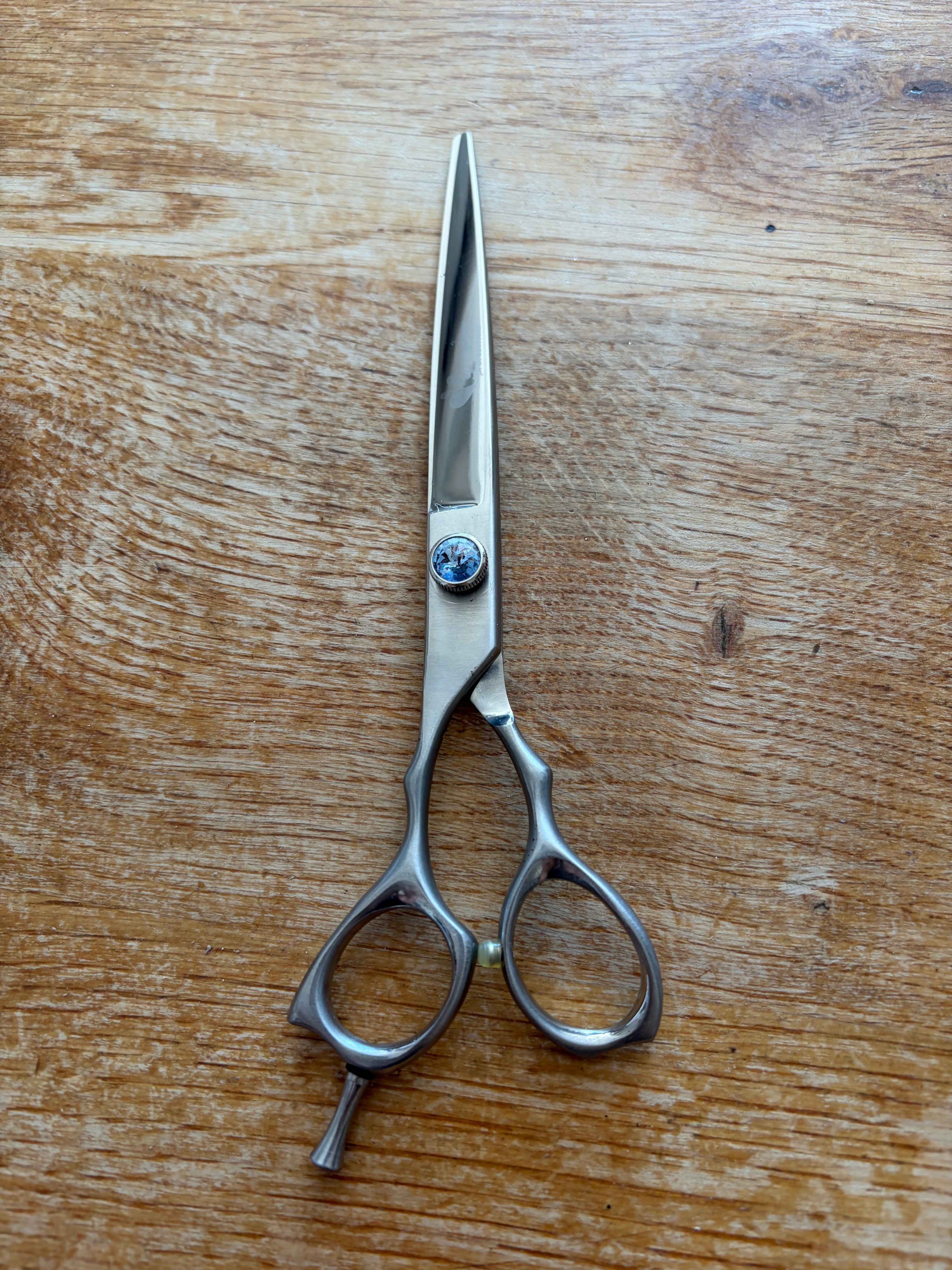 Used Groom Professional 7” straight scissor - Left hand