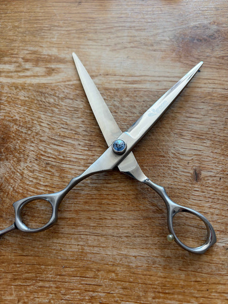 Used Groom Professional 7” straight scissor - Left hand