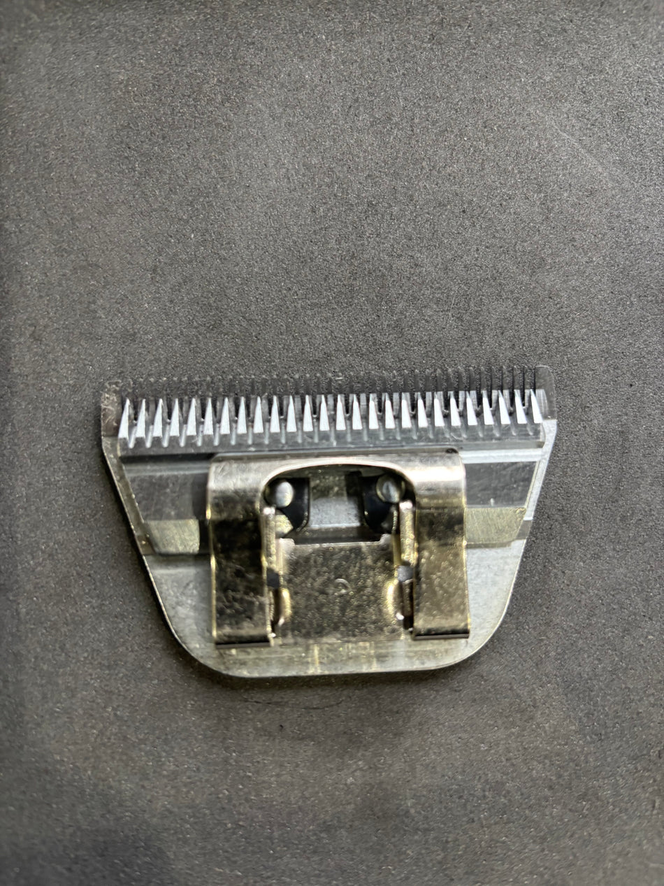 Used Heiniger 10WF 1.5mm blade - (67)